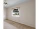 Bright bedroom with carpeted floor and window coverings at 3618 Highland Fairways Blvd, Lakeland, FL 33810