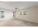 Spacious bedroom with ceiling fan and windows at 3618 Highland Fairways Blvd, Lakeland, FL 33810