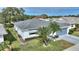 Single-story home with a gray roof, attached garage, and landscaped yard at 3618 Highland Fairways Blvd, Lakeland, FL 33810