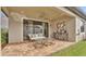 Relaxing covered patio with seating area, perfect for outdoor enjoyment at 4003 Solamor St, Lakeland, FL 33810