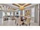 Bright dining room with a wood table and modern chandelier at 4003 Solamor St, Lakeland, FL 33810