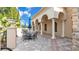 Community patio with tables, chairs, and umbrellas at 4003 Solamor St, Lakeland, FL 33810