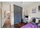 Bedroom with gray bedding and a built-in desk at 4009 Oakley Way, Lakeland, FL 33813