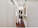 Bright hallway with hardwood floors and decorative wall accents at 4009 Oakley Way, Lakeland, FL 33813