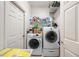 Laundry room with washer, dryer, and storage at 4009 Oakley Way, Lakeland, FL 33813