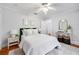 Spacious bedroom with hardwood floors and a ceiling fan at 401 E Belmar St, Lakeland, FL 33803