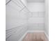 Large walk-in closet with wire shelving for storage at 401 E Belmar St, Lakeland, FL 33803