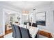 Elegant dining room showcasing hardwood floors and modern art at 401 E Belmar St, Lakeland, FL 33803