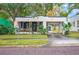 Cute bungalow with a porch and driveway at 401 E Belmar St, Lakeland, FL 33803