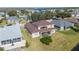 Aerial view of home with screened patio and large backyard at 4048 Windchime Ln, Lakeland, FL 33811