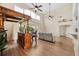 Living room features a built-in bar and hardwood floors at 4048 Windchime Ln, Lakeland, FL 33811