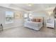 Bright bedroom featuring a king bed, plush pillows, and ample natural light at 4179 Oaktree Dr, Davenport, FL 33837