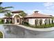 Community clubhouse with Spanish-style architecture at 4179 Oaktree Dr, Davenport, FL 33837