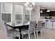 Bright dining room with a large table and patterned chairs at 4179 Oaktree Dr, Davenport, FL 33837