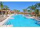 Large resort-style pool with lounge chairs at 4179 Oaktree Dr, Davenport, FL 33837