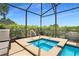 Relaxing outdoor spa with pool access at 4179 Oaktree Dr, Davenport, FL 33837