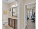 Double vanity bathroom with granite countertops at 4224 Prima Lago Dr, Lakeland, FL 33810