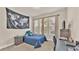 Well-lit bedroom with a comfortable bed and workspace at 4224 Prima Lago Dr, Lakeland, FL 33810