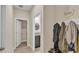 Hallway with coat rack and access to other rooms at 4224 Prima Lago Dr, Lakeland, FL 33810