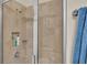 Clean shower with tiled walls and glass enclosure at 4224 Prima Lago Dr, Lakeland, FL 33810