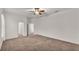 Bright bedroom with ceiling fan and neutral carpeting at 4236 Dinner Lake St, Lake Wales, FL 33859