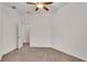 Spacious bedroom with ceiling fan and carpeting at 4236 Dinner Lake St, Lake Wales, FL 33859