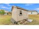 Large storage shed with double doors and window at 4236 Dinner Lake St, Lake Wales, FL 33859