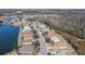 Aerial view of houses near a lake at 4308 Whistlewood Cir, Lakeland, FL 33811