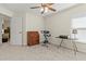 Bedroom with desk, exercise bike, and ample closet space at 4308 Whistlewood Cir, Lakeland, FL 33811