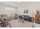 Comfortable living room featuring two armchairs and a sofa at 4308 Whistlewood Cir, Lakeland, FL 33811