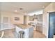 Modern kitchen with gray cabinets, granite countertops, and stainless steel appliances at 442 Jacks Way, Davenport, FL 33837