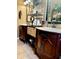 Bathroom with double vanity and storage at 4435 Fairway Oaks Dr, Mulberry, FL 33860