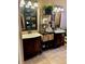 Elegant bathroom with double vanity and large mirror at 4435 Fairway Oaks Dr, Mulberry, FL 33860