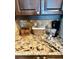 Kitchen counter with coffee maker and storage at 4435 Fairway Oaks Dr, Mulberry, FL 33860