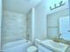 Small bathroom with a single vanity and shower/tub combo at 527 Tanaro Ln, Haines City, FL 33844