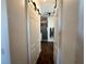 Bathroom with gray cabinets, a frameless shower, and modern vanity at 593 Meandering Way, Polk City, FL 33868