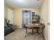 Home office features a desk, chair, and comfortable couch at 6358 Alamanda Hills Dr, Lakeland, FL 33813