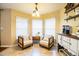 Cozy kitchen nook with two chairs and a small table, perfect for morning coffee at 6358 Alamanda Hills Dr, Lakeland, FL 33813