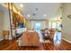 Bright living room with hardwood floors and a rustic barn door feature at 6358 Alamanda Hills Dr, Lakeland, FL 33813