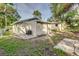 Backyard view of detached building and AC unit at 638 W Thomas St, Lakeland, FL 33805