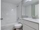 Clean bathroom, white subway tile, and marble vanity at 638 W Thomas St, Lakeland, FL 33805