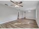 Open living space with hardwood floors, recessed lighting, and ceiling fan at 638 W Thomas St, Lakeland, FL 33805