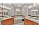 Double vanity bathroom with garden tub and tile at 649 Grasslands Village Cir, Lakeland, FL 33803