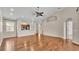 Bright living room featuring hardwood floors and high ceilings at 649 Grasslands Village Cir, Lakeland, FL 33803