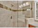 Walk-in shower with glass enclosure and tile surround at 649 Grasslands Village Cir, Lakeland, FL 33803