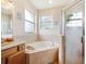 Relaxing bathroom with a corner soaking tub and shower at 6550 Evergreen Park Dr, Lakeland, FL 33813