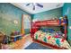 bedroom with bunk bed and colorful decor at 6550 Evergreen Park Dr, Lakeland, FL 33813