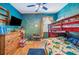 bedroom with bunk bed and colorful decor at 6550 Evergreen Park Dr, Lakeland, FL 33813