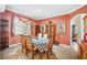 Charming dining room with wooden table and black and white tablecloth at 6550 Evergreen Park Dr, Lakeland, FL 33813