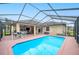 Relaxing screened-in pool and patio area at 6550 Evergreen Park Dr, Lakeland, FL 33813